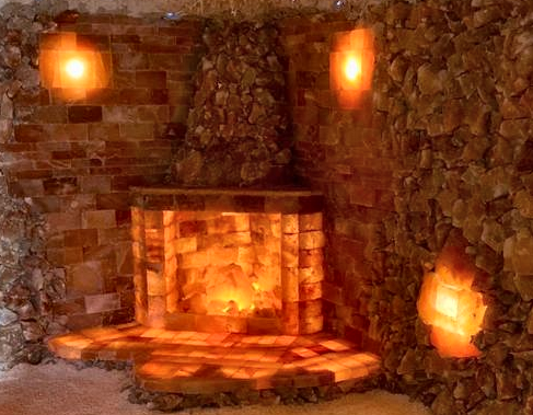 The fireplace with chimney stack add-on is a brilliant eye-catching center piece for any salt room